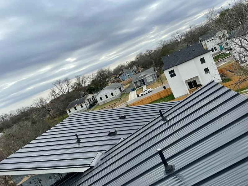 Standing seam metal roof panels with vents for Skylight Repair in Highland